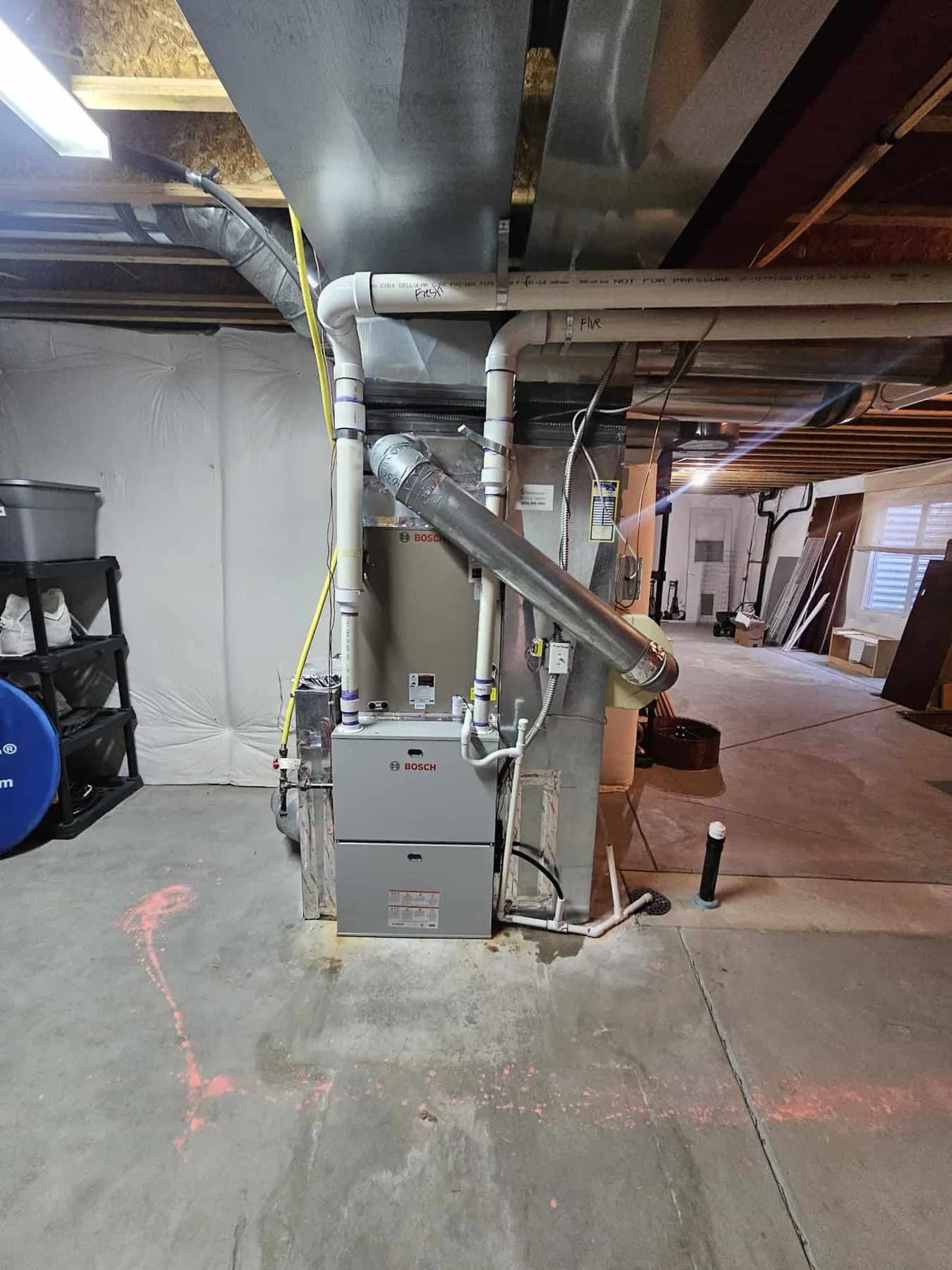 Furnace and cased coil beneath existing basement ductwork